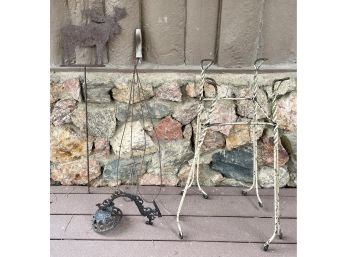 Antique Primitive Lot Including Metal Twist Table Base, Outdoor Sconce, Rug Beater, And Yard Moose