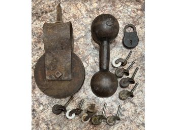 Antique Lot Including 10 Lbs Dumbbell, Lock, Pulley, And Assorted Casters