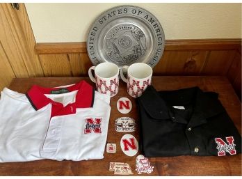 Collection Of Nebraska And Huskers Memorabilia - Pewter Plate, Shirts, Mug, Magnets, And More