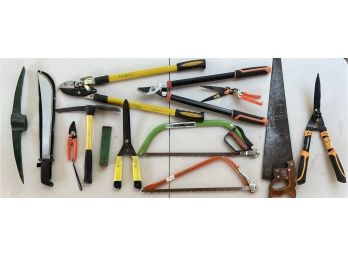 Collection Of Hand Tools - Machete, Shears, Bow Saws, Pick Axe, And More