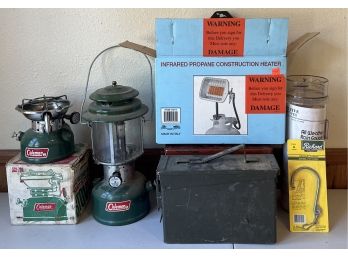 Outdoors Lot Including Colman Propane Heater And Lantern, Inferred Propane Heater, Rain Gauge, And More