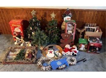 Large Collection Of Christmas Decor Including Small Trees, Wooden Snowmen, Light Up Window Pane, And More