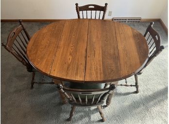 Solid Oak Drop Leaf Table With 4 Oak Naugahyde Spindle Back Chairs