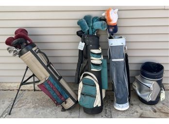 (3) Gold Bags With Assorted Clubs, Balls, Tee, And Head Covers