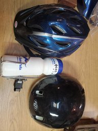 Lot Of Bike Helmets With Water Bottle And Mounting Rack For Bike