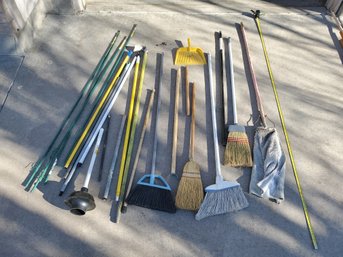 Lot Of Brooms, Dustpans, And Handles
