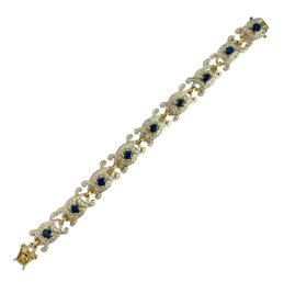 Yellow Gold Over Sterling Silver Bracelet With Blue Stone Or Glass