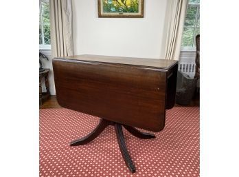 Antique Drop Leaf Pedestal Table In Mahogany