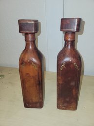 Pair Of Leather Wrapped Bottles