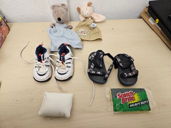 2 Paris Of Child's Shoes, 2 Puppets, 1 Pillow, And 1 Scrub