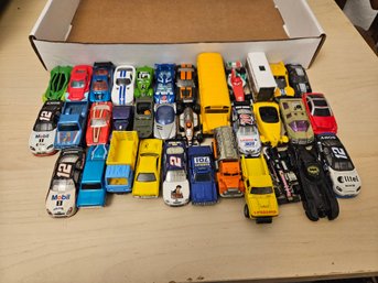 34 Die Cast Cars And A Bus