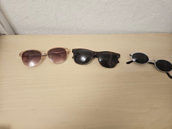 3 Sunglasses 1 Roca Wear, 1 Express And 1 China