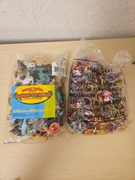 1 Bag Of Fun Toy Rings And 1 Bag Of Toy Animals