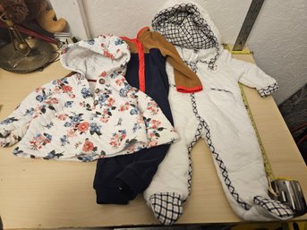 3 Child Outfits -  1 Floral Jacket 12m, Brown And Black Onesie 9m, White Checkered Onesie 6-9m