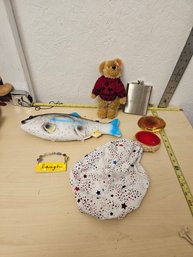 1 Fish, 1 Ty Teddy Bear, 1 Metal Flask, 1 Laugh Bracelet, 1 Stars Hat, 1 Golden Box With Red Fabric