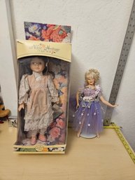 2 Dolls - 1 Noble Heritage, 1 Doll With A Purple Dress