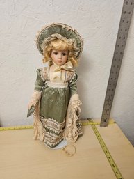 Doll In Fancy Green Clothes