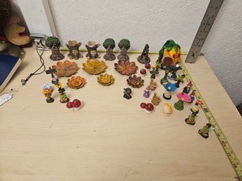 Lot Of Gnome Toys And Metal Flowers