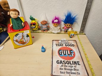 Misc Toy Lot - 1 Curious George In A Box, 3 Trolls, 1 Stuffed Pineapple, 1 Gasoline Sign, 1 Party Hat
