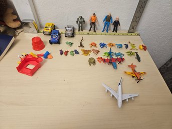 Toy Lot - Many Animal Toys, 4 Action Figures, 3 Toy Cars, 3 Toy Planes, Mickey Mouse Toy Set