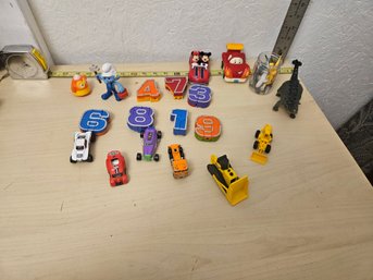 Toy Lot - 7 Transforming Numbers, 8 Toy Cars, 1 Smurf, 1 Dinosaur, Many Toy Animals