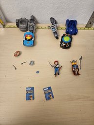 Misc Toy Lot - 2 Action Mobil Figures With More Weapons, 3 Toy Cars, 2 Toy Bikes