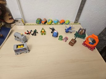 Misc Toy Lot - 10 Toy Cars, 4 Action Figures, 1 Toy Plane, 4 Toy Moving Train Carts