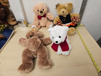 4 Stuffed Animals - 1 Garanimals, 1 Michaels, 1 Edi Bear