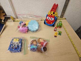 Set Of Toys - 1 SpongeBob, 3 Princes Plastic Figures, 3 Mario Figures, 1 Peashooter, 1 Toy Truck, 5 Toy Cars
