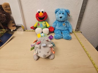 3 Stuffed Animals - 1 Taggies Signature Collection, 1 TY Stuffed Animal, Elmo Makes Sound