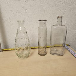 Tall Glass Bottle Trio: One UV-Reactive Accent'