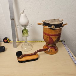 Artistic Display: White Pear On Glass Stand With Native American Drum & Brush