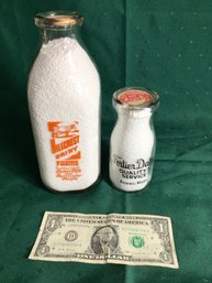 Two Vintage Milk Bottles