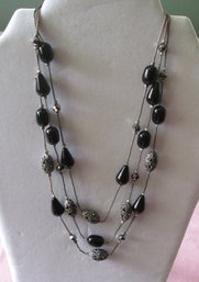 Lovely Three Strand Black And Metallic Beaded Neclace