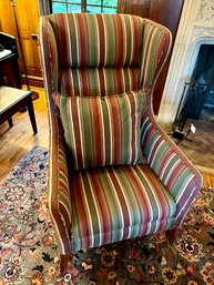 Wingback Sitting Chair In A Striped Pattern