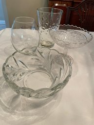 Lot 4  Medium Glass Pieces.  Vases And Bowls