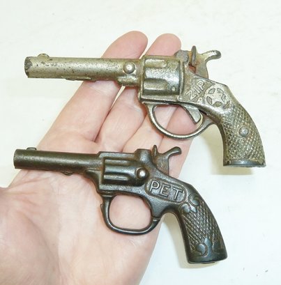 2 Antique Iron Cap Guns