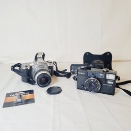 Set Of 2 Minolta Cameras