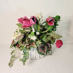 Faux Flower Arrangement In White Basket