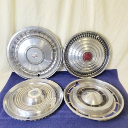 4 Different Brand Hubcaps