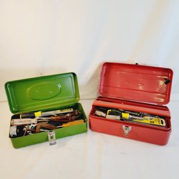 Green And Red Toolboxes With Tools Inside