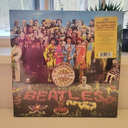 Still Sealed!! New Beatles Anniversary Album (bsmt)