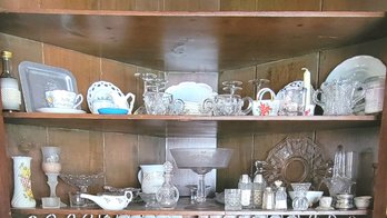2 Shelves Full Of China Dishes, Glassware, Salt And Pepper Shakers And More