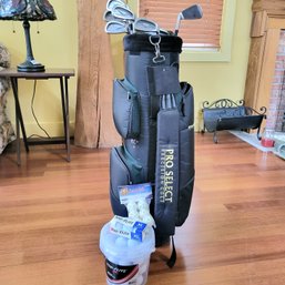 Golf Clubs, Bag And Bucket Of Golf Balls (Great Room)