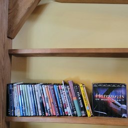 Small Lot Of DVDs And 1 Set Of VHS Tapes (Great Room)
