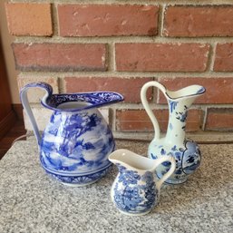 Delft, Royal Doulton And Royal Staffordshire Pitchers (LR)