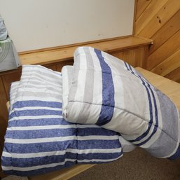 Pair Of Reversible Twin Size Comforters (Bsmt)