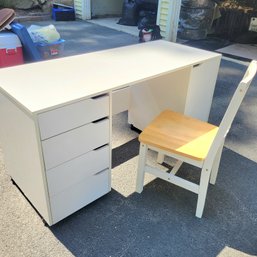 Particle Board Desk And Wood Chair *Desk Has A Broken Corner (Garage)