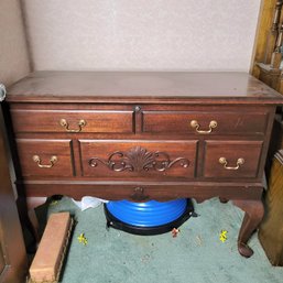 Beautiful Footed Lane Cedar Chest With Lace Tablecloth And Other Content (hallway)