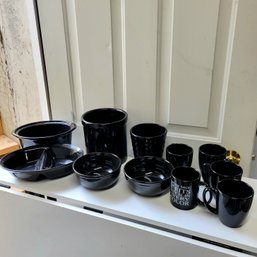 Lot Of Black Dishes, Canisters And Mugs